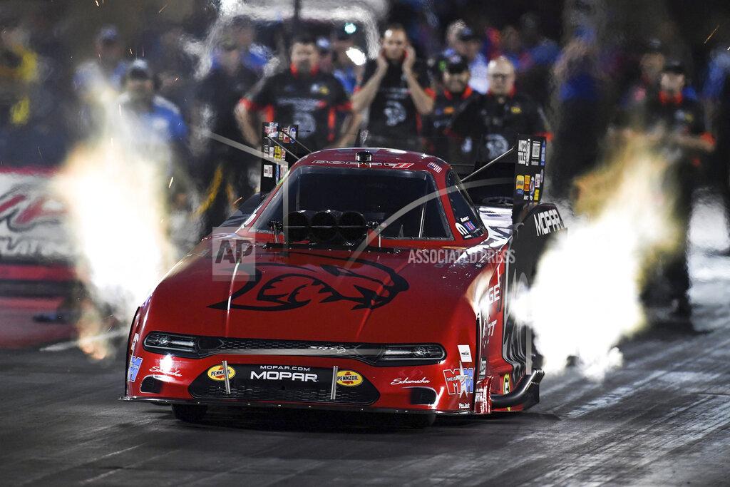 Richard H Shute In this photo provided by the NHRA, Matt Hagan takes part in Funny Car qualifying at the Dodge//SRT Mile-High NHRA Nationals drag races Friday, July 16, 2021, at :Bandimere Speedway in Morrison, Colo. (Richard H Shute/NHRA via AP)