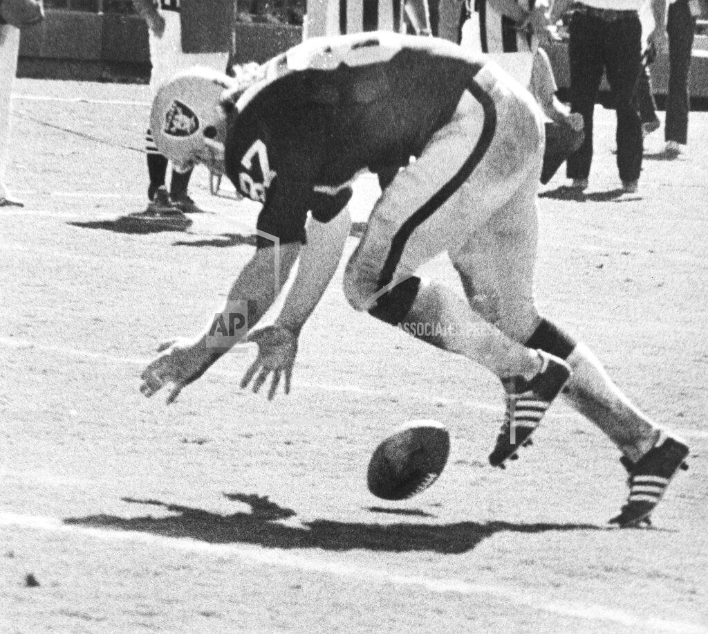 Thane Mcintosh FILE - In this Sept. 11, 1978, file photo, Oakland Raiders tight end Dave Casper reaches for the tumbling football a moment before it rolled into the end zone and he fell on the ball for the game-winning score in the final minute of play against the San Diego Chargers, in San Diego. With nowhere to throw the ball, Raiders quarterback Ken Stabler either fumbled or pushed the ball forward on purpose, depending on which side of the rivalry is telling the story. Teammate Pete Banaszak then knocked the ball further ahead from about the 13-yard line as it rolled toward the end zone. Tight end Dave Casper kicked the ball forward at the 5 and then fell on it in the end zone with no time remaining. (Thane McIntosh/The San Diego Union-Tribune via AP, File)