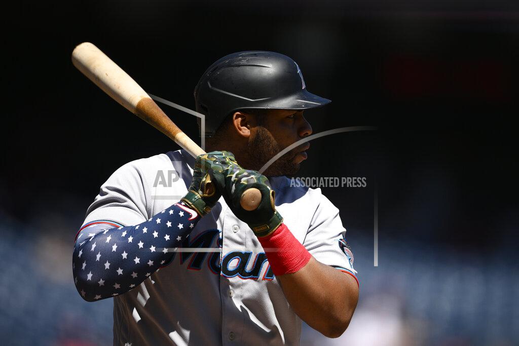 Nick Wass Miami Marlins' Jesus Aguilar wears a patriotic themed arm sleeve during his at bat in the first inning of a baseball game against the Washington Nationals, Monday, July 4, 2022, in Washington. (AP Photo/Nick Wass)
