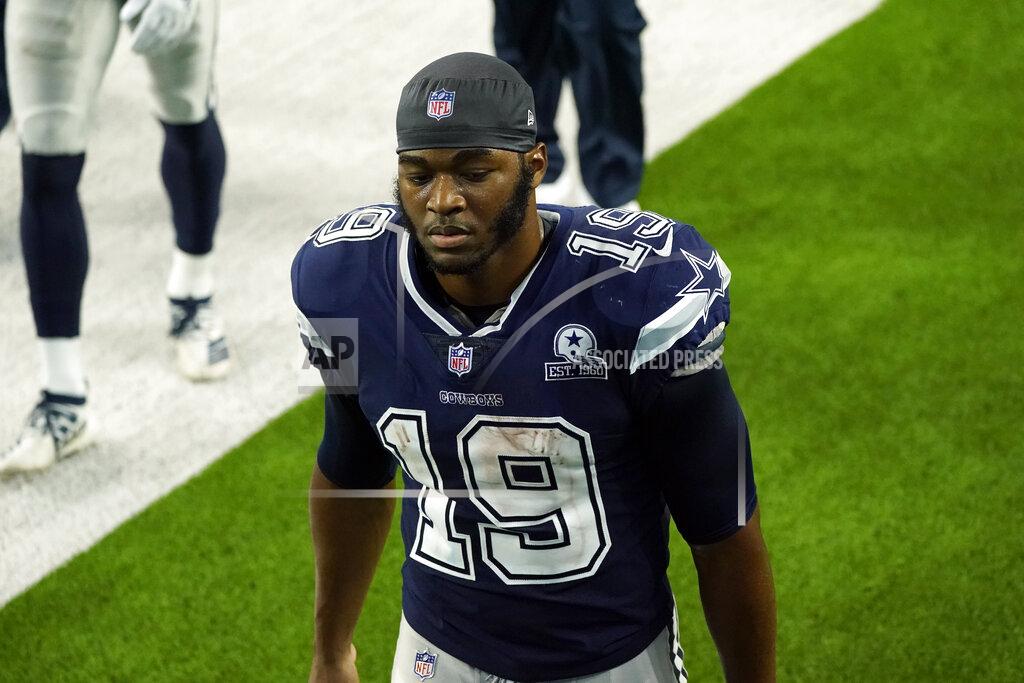 Ashley Landis Dallas Cowboys wide receiver Amari Cooper (19) walks off the field after a loss to the Los Angeles Rams during an NFL football game Sunday, Sept. 13, 2020, in Inglewood, Calif. (AP Photo/Ashley Landis )