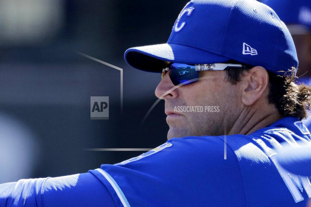 Charlie Riedel FILE - In this Feb. 24, 2020, file photo, Kansas City Royals manager Mike Matheny watches from the dugout during the second inning of a spring training baseball game against the San Diego Padres in Surprise, Ariz. The Royals had an entire offseason and most of spring training to get to know Mike Matheny. But one unintended consequence of the coronavirus pandemic is they've gotten to know their new manager better than they could ever have imagined. (AP Photo/Charlie Riedel, File)