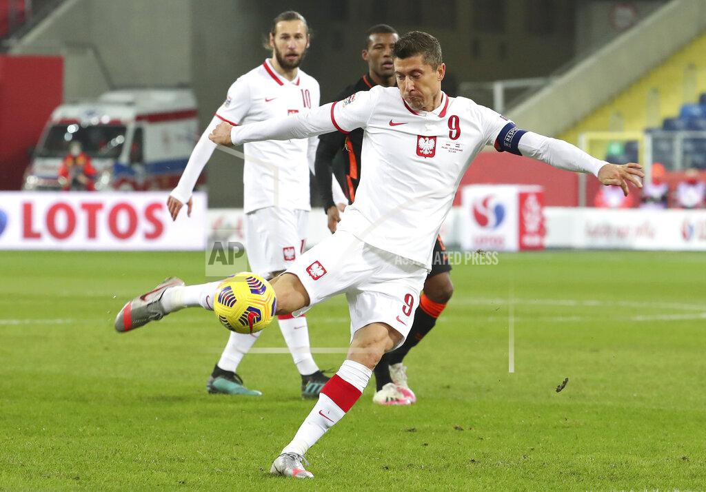Czarek Sokolowski Poland's Robert Lewandowski shoots on goal during the Nations League soccer match between Poland and The Netherlands at Silesian Stadium in Chorzow, Poland, Wednesday, Nov. 18, 2020. (AP Photo/Czarek Sokolowski)