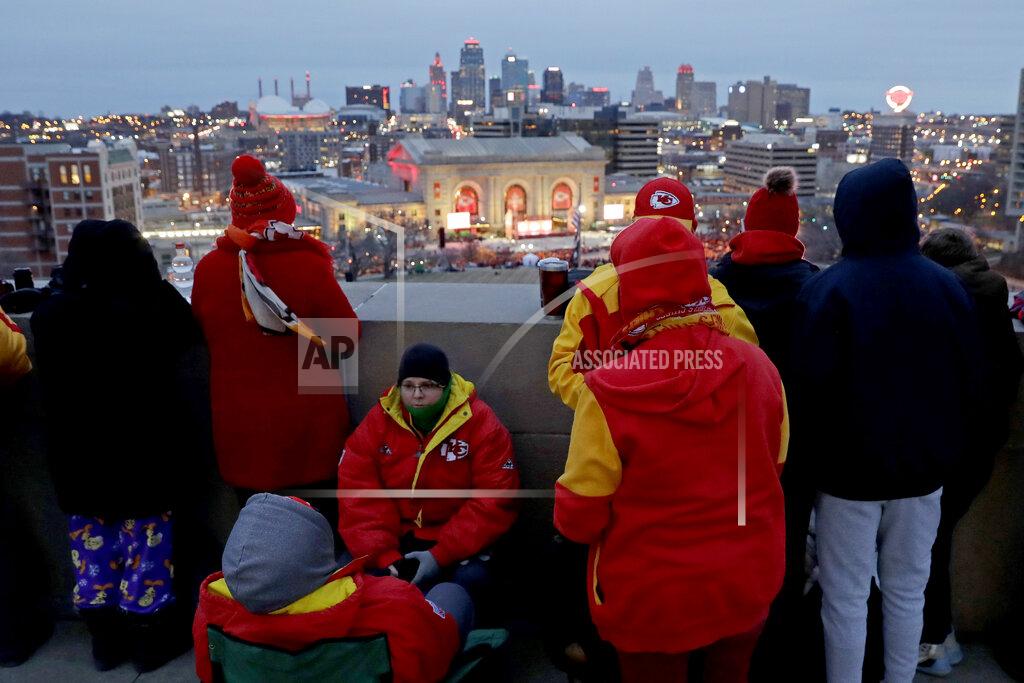 Charlie Riedel People gather at the Liberty Memorial as they wait for a parade through downtown Kansas City, Mo. to celebrate the Kansas City Chiefs victory in NFL's Super Bowl 54 Wednesday, Feb. 5, 2020. (AP Photo/Charlie Riedel)