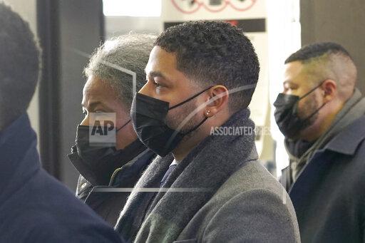 Actor Jussie Smollett arrives with his mother Janet at the Leighton Criminal Courthouse on Wednesday, Dec. 8, 2021, day seven of his trial in Chicago. (AP Photo/Charles Rex Arbogast)