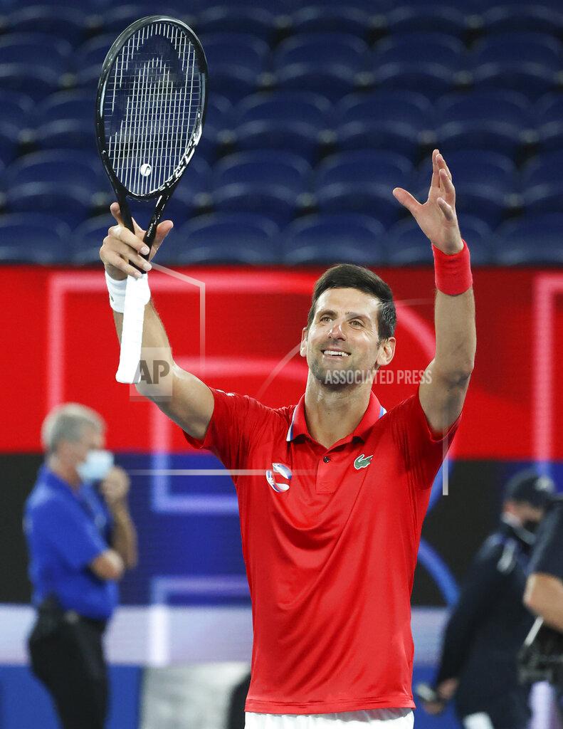 Hamish Blair Serbia's Novak Djokovic celebrates after defeating Germany's Alexander Zverev in their ATP Cup match in Melbourne, Australia, Friday, Feb. 5, 2021.(AP Photo/Hamish Blair)