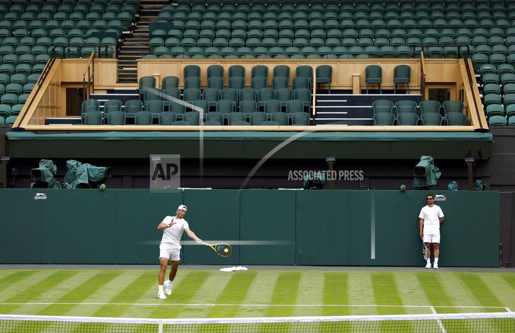 Steven Paston Spain's Rafael Nadal practices against Italy's Matteo Berrettini on Center Court ahead of the 2022 Wimbledon Championship at the All England Lawn Tennis and Croquet Club, in London, Thursday, June 23, 2022. (Steven Paston/PA via AP)
