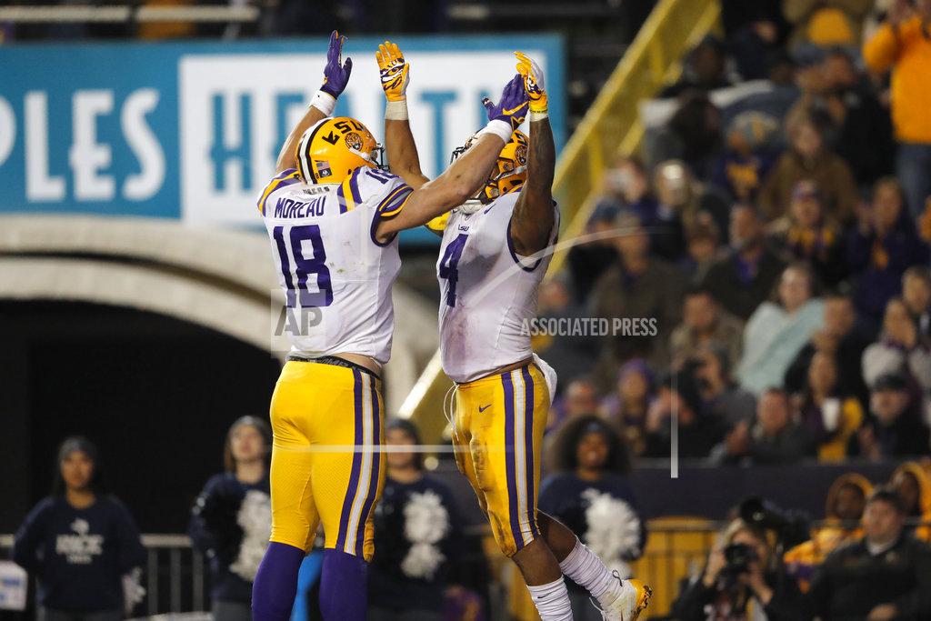 Gerald Herbert LSU running back Nick Brossette (4) celebrates his touchdown with tight end Foster Moreau (18) in the second half of an NCAA college football game against Rice in Baton Rouge, La., Saturday, Nov. 17, 2018. (AP Photo/Gerald Herbert)