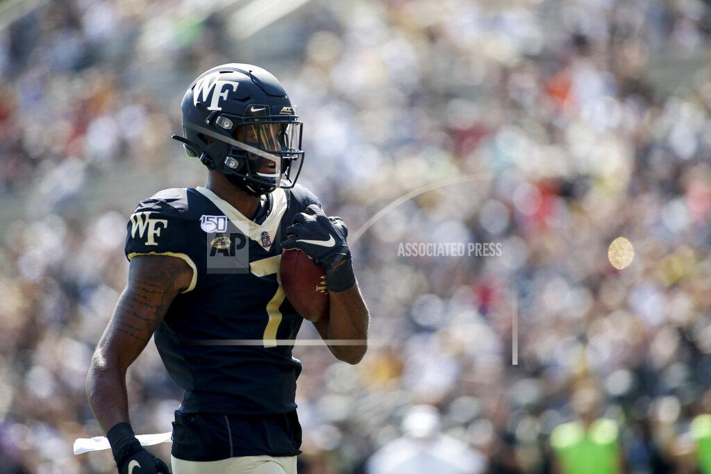 Nell Redmond Wake Forest wide receiver Scotty Washington scores a touchdown against Elon in the first half of an NCAA college football game in Winston-Salem, N.C., Saturday, Sept. 21, 2019. (AP Photo/Nell Redmond)