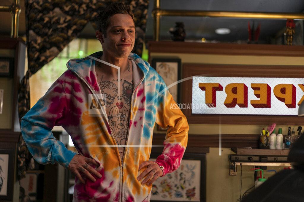 Mary Cybulski In this image released by Universal Pictures, Pete Davidson appears in a scene from "The King of Staten Island," directed by Judd Apatow. (Mary Cybulski/Universal Pictures via AP)