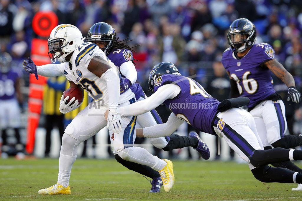 Carolyn Kaster Los Angeles Chargers defensive back Desmond King, left, rushes past Baltimore Ravens cornerback Maurice Canady, from left, long snapper Morgan Cox and defensive back Chuck Clark in the second half of an NFL wild card playoff football game, Sunday, Jan. 6, 2019, in Baltimore. (AP Photo/Carolyn Kaster)