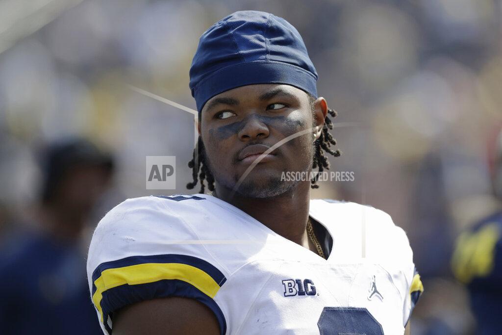 In this April 15, 2017, photo, Michigan defensive end Rashan Gary is seen during the Michigan spring football game in Ann Arbor, Mich. Former Michigan star Gary is the CEO of his own sports agency, fulfilling a vision he had as a high school star in New Jersey. The defensive end has already recruited one NFL prospect to Rashan Gary Sports. And, he hopes to land more players from MLB, the NBA and NHL by promoting the agency as a place professional athletes can take advantage of their power. (AP Photo/Carlos Osorio)