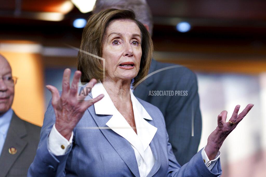 J. Scott Applewhite FILE - In this June 30, 2021 file photo, Speaker of the House Nancy Pelosi, D-Calif., responds to a question at a news conference as the House prepares to vote on the creation of a select committee to investigate the Jan. 6 insurrection, at the Capitol in Washington. Pelosi is rejecting two Republicans tapped by House GOP Leader Kevin McCarthy to sit on a committee investigating the Jan. 6 Capitol insurrection. She cited the “integrity” of the investigation. Pelosi said in a statement Wednesday that she would not accept the appointments of Indiana Rep. Jim Banks, whom McCarthy picked to be the top Republican on the panel, or Ohio Rep. Jim Jordan. Both are close allies of former President Donald Trump. (AP Photo/J. Scott Applewhite, File)