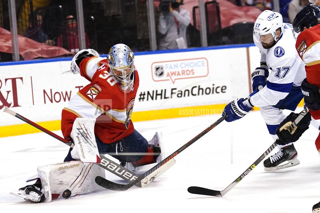 Lynne Sladky Florida Panthers goaltender Spencer Knight (30) stops a shot on the goal by Tampa Bay Lightning left wing Alex Killorn (17) during the first period in Game 5 of an NHL hockey Stanley Cup first-round playoff series, Monday, May 24, 2021, in Sunrise, Fla. (AP Photo/Lynne Sladky)