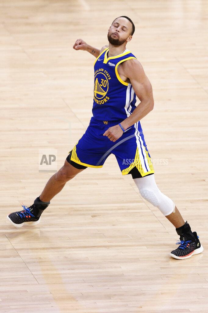 Santiago Mejia Golden State Warriors guard Stephen Curry (30) celebrates a 3-point shot late in the fourth quarter against the Memphis Grizzlies in Game 6 of the Western Conference semifinals of the NBA basketball playoffs in San Francisco on Friday, May 13, 2022. The Warriors defeated the Grizzlies 110-96 to advance to the conference finals. (Santiago Mejia/San Francisco Chronicle via AP)