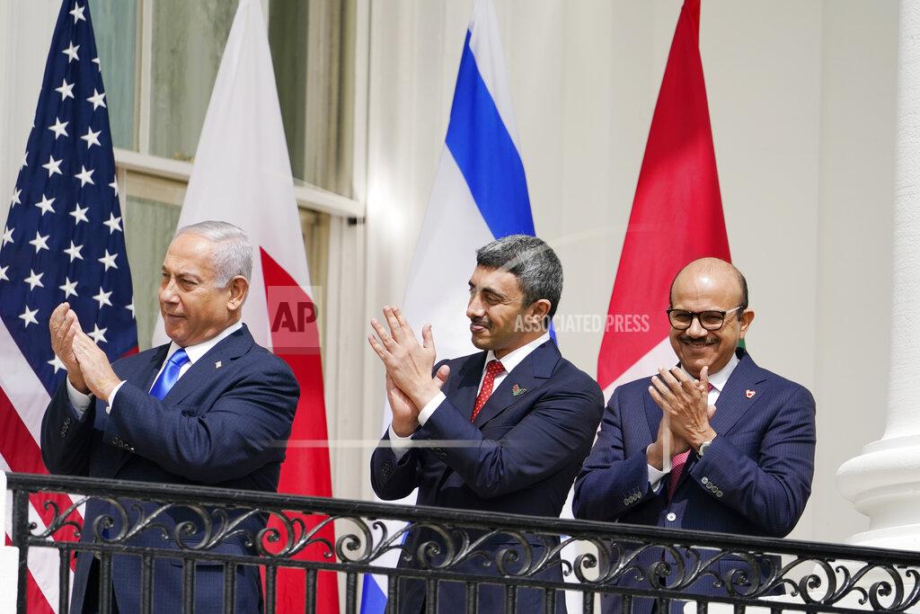 Alex Brandon Israeli Prime Minister Benjamin Netanyahu, United Arab Emirates Foreign Minister Abdullah bin Zayed al-NahyanAbraham and Bahrain Foreign Minister Khalid bin Ahmed Al Khalifa stand on the Blue Room Balcony during the Abraham Accords signing ceremony on the South Lawn of the White House, Tuesday, Sept. 15, 2020, in Washington. (AP Photo/Alex Brandon)