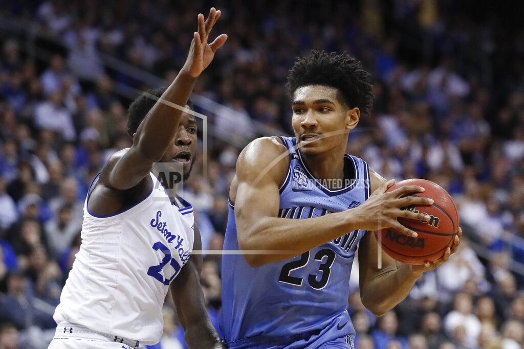 John Minchillo Villanova's Jermaine Samuels (23) drives against Seton Hall's Myles Cale, left, during the first half of an NCAA college basketball game, Wednesday, March 4, 2020, in Newark, N.J. (AP Photo/John Minchillo)