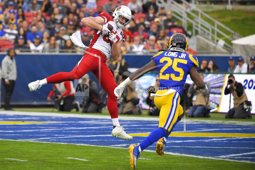 Mark J. Terrill Arizona Cardinals tight end Dan Arnold catches a touchdown pass in front of Los Angeles Rams defensive back David Long during first half of an NFL football game Sunday, Dec. 29, 2019, in Los Angeles. (AP Photo/Mark J. Terrill)