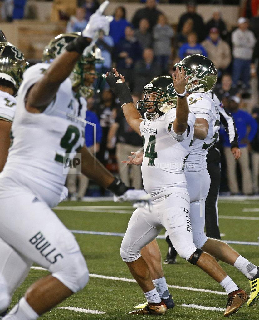 Sue Ogrocki FILE - In this Oct. 12, 2018, file photo, South Florida's Coby Weiss (24) celebrates his go-ahead field goal in the final minutes of the team's NCAA college football game against Tulsa, in Tulsa, Okla. Thanks to three fourth-quarter comebacks, No. 21 South Florida remains one of eight unbeaten teams in the Football Bowl Subdivision. Connecticut plays at South Florida on Saturday, Oct. 20, 2018. (AP Photo/Sue Ogrocki, File)