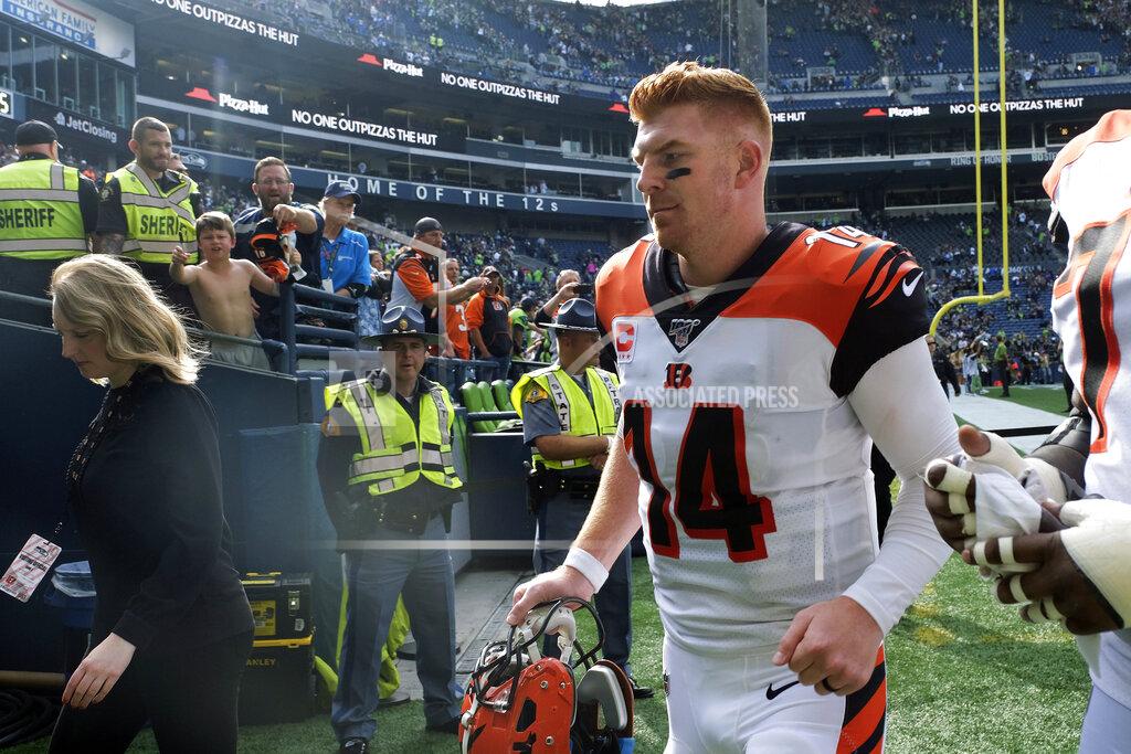 Stephen Brashear Cincinnati Bengals quarterback Andy Dalton (14) walks off the field after an NFL football game against the Seattle Seahawks, Sunday, Sept. 8, 2019, in Seattle. (AP Photo/Stephen Brashear)
