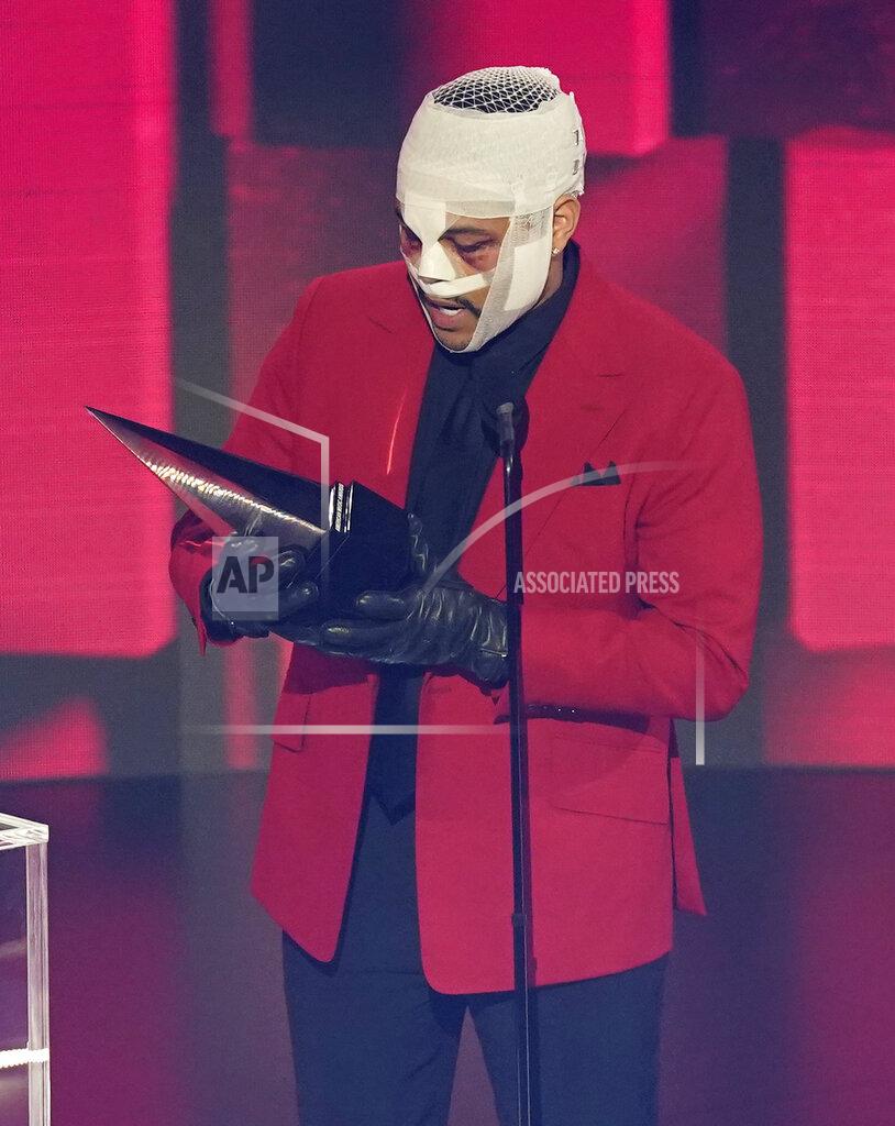 Chris Pizzello The Weeknd accepts the award for favorite soul/R&B album for "After Hours" at the American Music Awards on Sunday, Nov. 22, 2020, at the Microsoft Theater in Los Angeles. (AP Photo/Chris Pizzello)