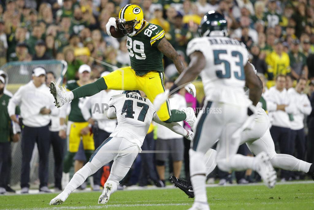 Jeffrey Phelps Green Bay Packers tight end Marcedes Lewis hurdles Philadelphia Eagles linebacker Nate Gerry during the first half of an NFL football game Thursday, Sept. 26, 2019, in Green Bay, Wis. (AP Photo/Jeffrey Phelps)
