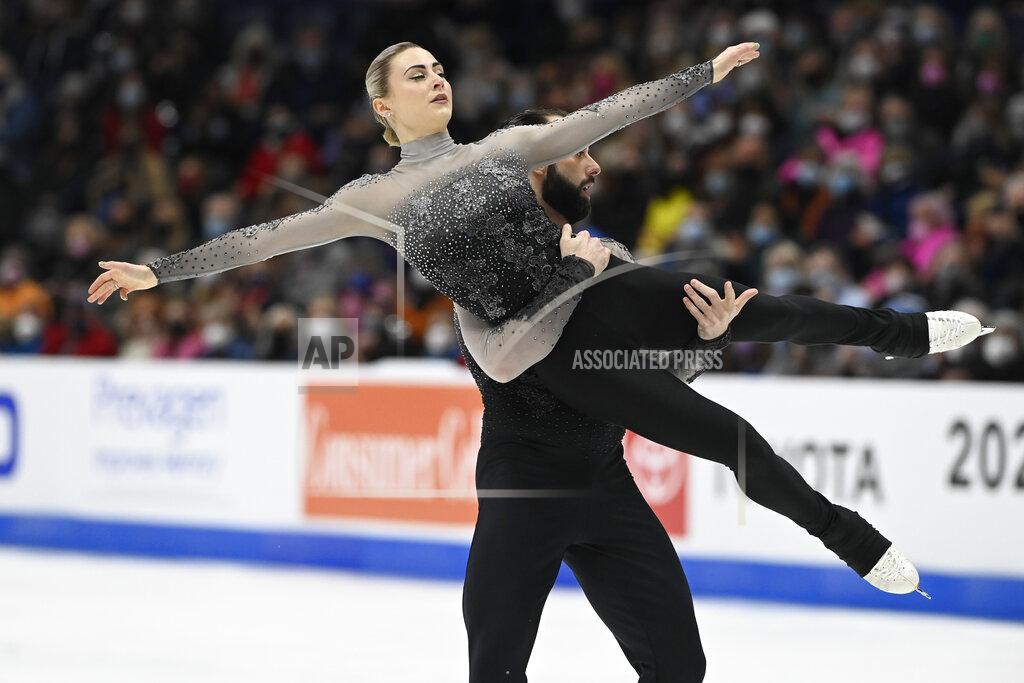 Mark Zaleski Ashley Cain-Gribble and Timothy LeDuc compete in the pairs free skate program during the U.S. Figure Skating Championships Saturday, Jan. 8, 2022, in Nashville, Tenn. (AP Photo/Mark Zaleski)