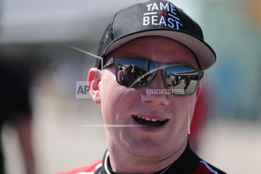 Luis M. Alvarez Tyler Reddick poses talks after winning the pole position for the NASCAR Xfinity Series auto racing championship at Homestead-Miami Speedway in Homestead, Fla. Saturday, Nov. 16, 2019. (AP Photo/Luis M. Alvarez)
