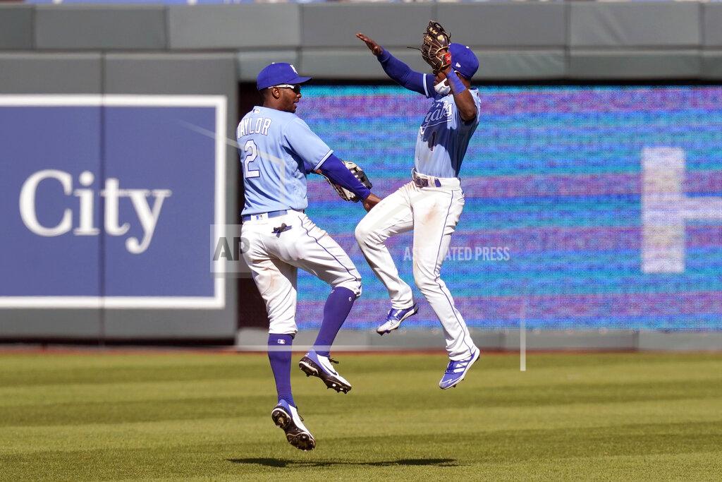Orlin Wagner Kansas City Royals center fielder Michael A. Taylor (2) and right fielder Jarrod Dyson (1) celebrate following a baseball game against the Los Angeles Angels at Kauffman Stadium in Kansas City, Mo., Wednesday, April 14, 2021. The Royals defeated the Angels 6-1. (AP Photo/Orlin Wagner)
