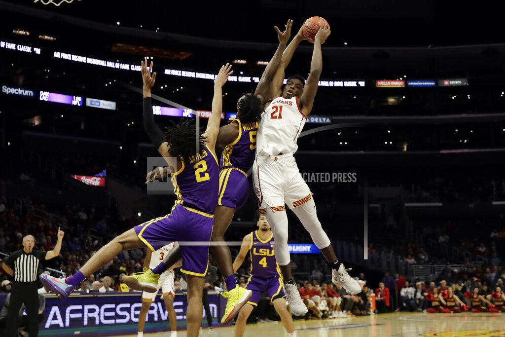 Marcio Jose Sanchez Southern California forward Onyeka Okongwu (21) grabs a rebound against LSU during the first half of an NCAA college basketball game Saturday, Dec. 21, 2019, in Los Angeles. (AP Photo/Marcio Jose Sanchez)