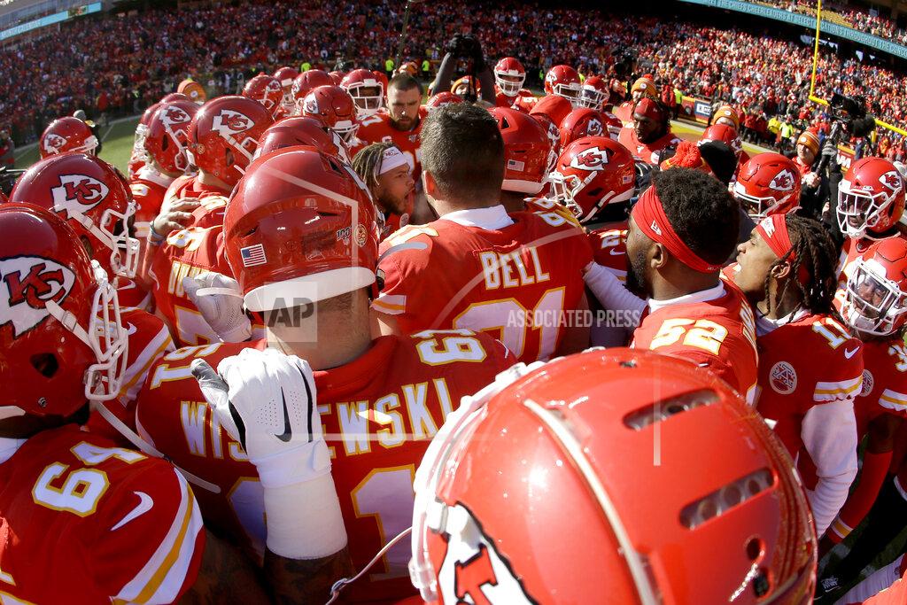 Charlie Riedel The Kansas City Chiefs huddles around safety Tyrann Mathieu before the NFL AFC Championship football game against the Tennessee Titans Sunday, Jan. 19, 2020, in Kansas City, MO. (AP Photo/Charlie Riedel)