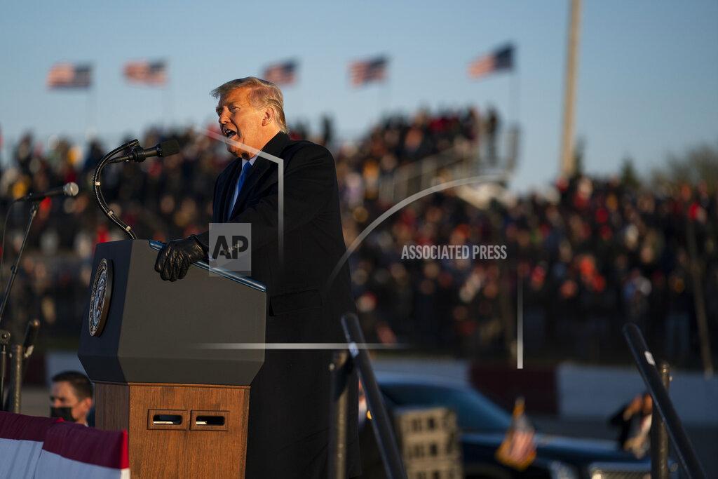 Evan Vucci President Donald Trump speaks during a campaign rally at MotorSports Management Company, Tuesday, Oct. 27, 2020, in West Salem, Wis. (AP Photo/Evan Vucci)
