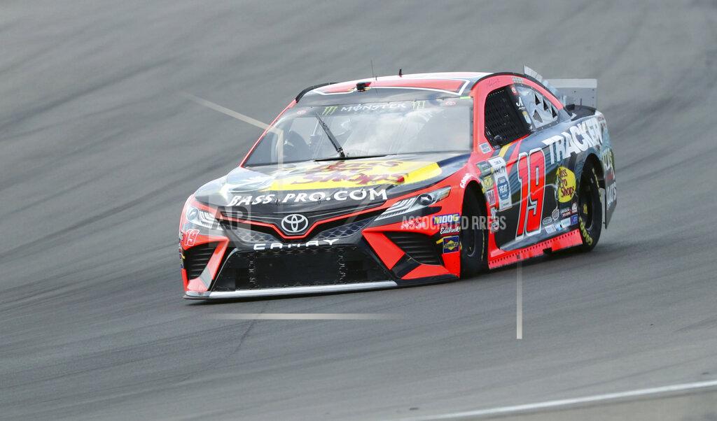 John Munson Martin Truex Jr. (19) heads into Turn 1 during practice for the NASCAR Cup Series auto race at Watkins Glen International, Saturday, Aug. 3, 2019, in Watkins Glen, N.Y. (AP Photo/John Munson)