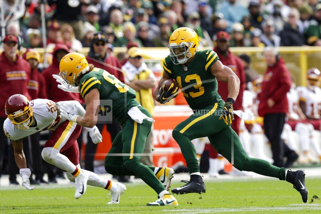Matt Ludtke Green Bay Packers' Allen Lazard catches a pass during the first half of an NFL football game against the Washington Football Team Sunday, Oct. 24, 2021, in Green Bay, Wis. (AP Photo/Matt Ludtke)