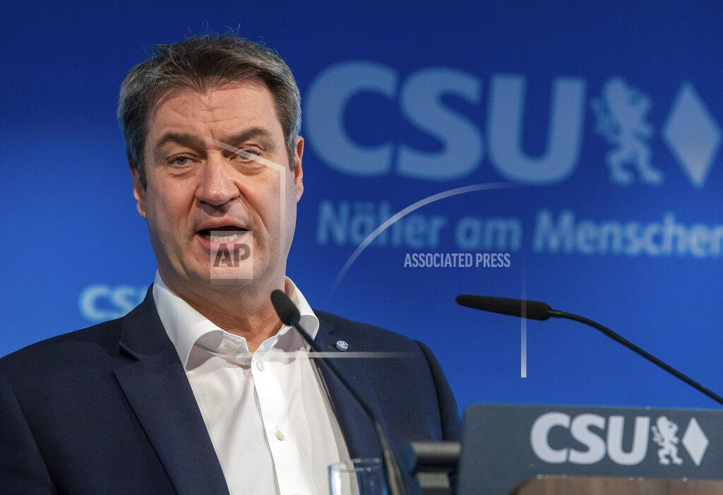 Peter Kneffel Markus Soeder, CSU party leader and Minister-President of Bavaria, talks to the media in Munich, Germany, Monday, March 15, 2021. Two German state election defeats have put the spotlight on chances of a government without Chancellor Angela Merkel's bloc after September's national vote. CSU leader Markus Soeder, the governor of Bavaria and one of two serious contenders to be the center-right candidate to replace Merkel, described the results as a “wake-up call.” (Peter Kneffel/dpa via AP)