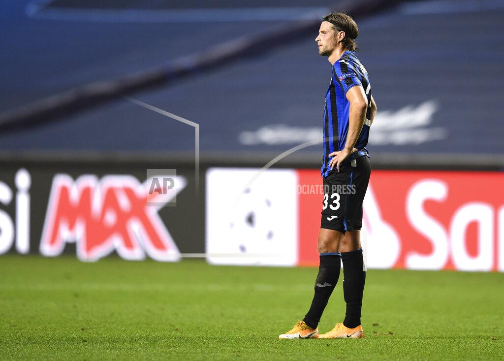 David Ramos Atalanta's Hans Hateboer reacts after his team's loss in the Champions League quarterfinal match between Atalanta and PSG at Luz stadium, Lisbon, Portugal, Wednesday, Aug. 12, 2020. (David Ramos/Pool Photo via AP)