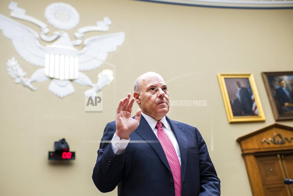 Tom Williams Postmaster General Louis DeJoy is sworn in before testifying during a House Oversight and Reform Committee hearing on the Postal Service on Capitol Hill, Monday, Aug. 24, 2020, in Washington. (Tom Williams/Pool via AP)