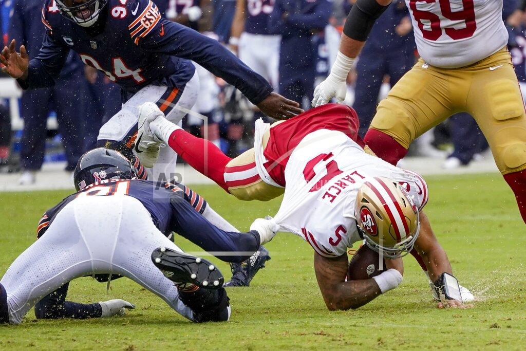 Charles Rex Arbogast Chicago Bears' Dominique Robinson sacks San Francisco 49ers' Trey Lance during the first half of an NFL football game Sunday, Sept. 11, 2022, in Chicago. (AP Photo/Charles Rex Arbogast)