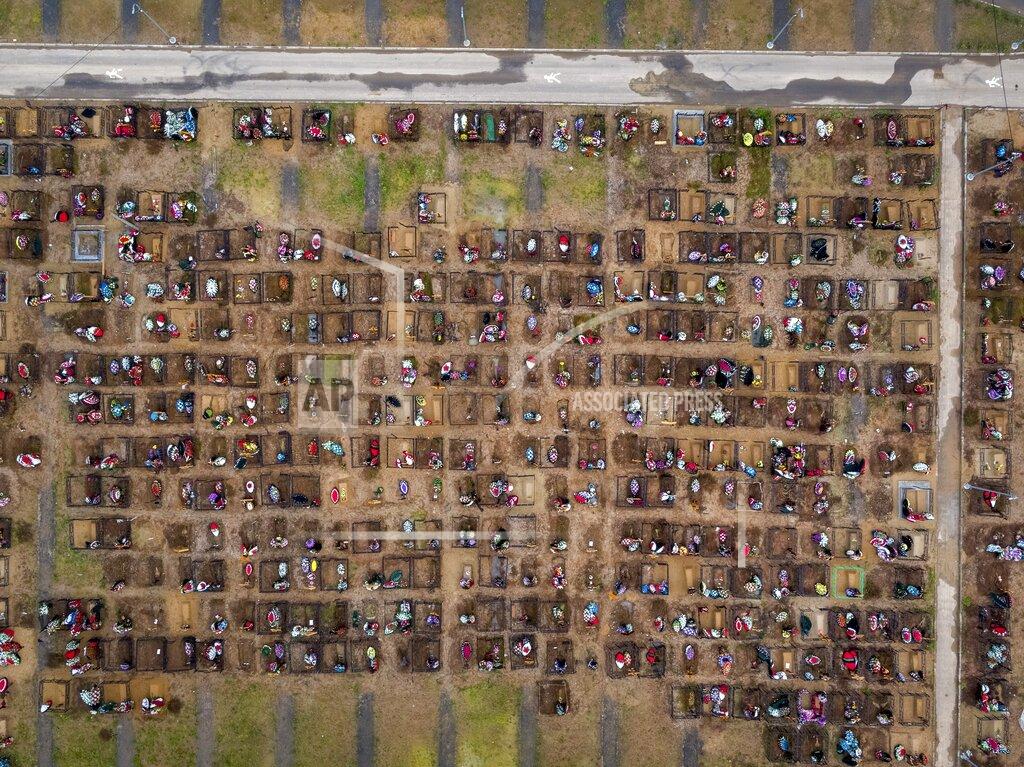 Dmitry Serebryakov This photo shows fresh graves at the Butovskoye cemetery, which serves as one of burial grounds for those who died of the coronavirus, in Moscow, Russia. The way Russia counts fatalities during the coronavirus pandemic could be one reason why its official death toll is far below many other countries, even as it has reported at least 511,000 infections, behind only the United States and Brazil. (AP Photo/Dmitry Serebryakov)