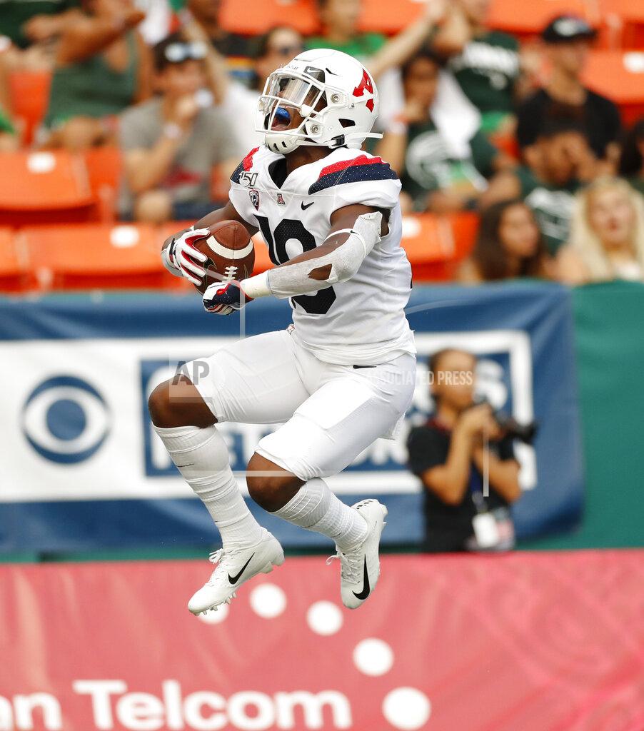 Marco Garcia Arizona wide receiver Jamarye Joiner celebrates his second-quarter touchdown against Hawaii during an NCAA college football game Saturday, Aug. 24, 2019, in Honolulu. (AP Photo/Marco Garcia)