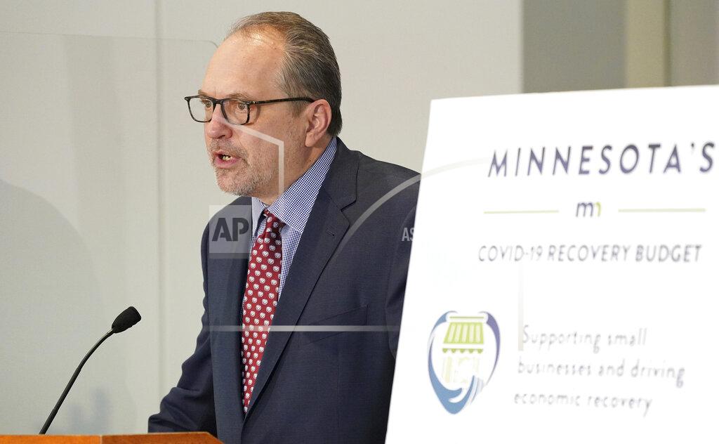Anthony Souffle Minnesota Management and Budget Commissioner Jim Schowalter speaks during a news conference to debut the state budget plan for the next two years Tuesday, Jan. 26, 2021 at the Department of Revenue building in St. Paul, Minn. (Anthony Souffle/Star Tribune via AP)