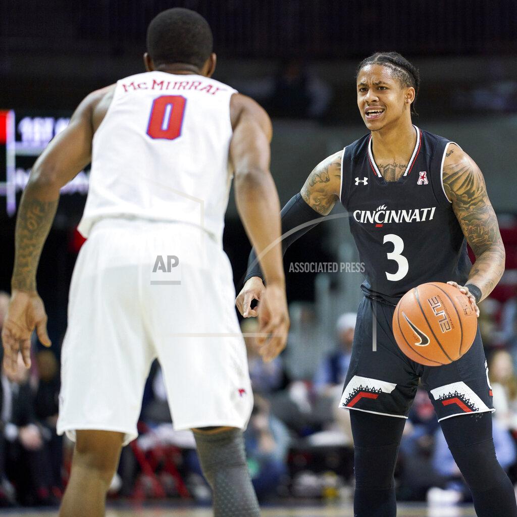 Cooper Neill Cincinnati guard Justin Jenifer (3) brings the ball up court against SMU's Jahmal McMurray (0) during the first half of an NCAA college basketball game at Moody Coliseum, Wednesday, Feb. 27, 2019, in Dallas. (AP Photo/Cooper Neill)