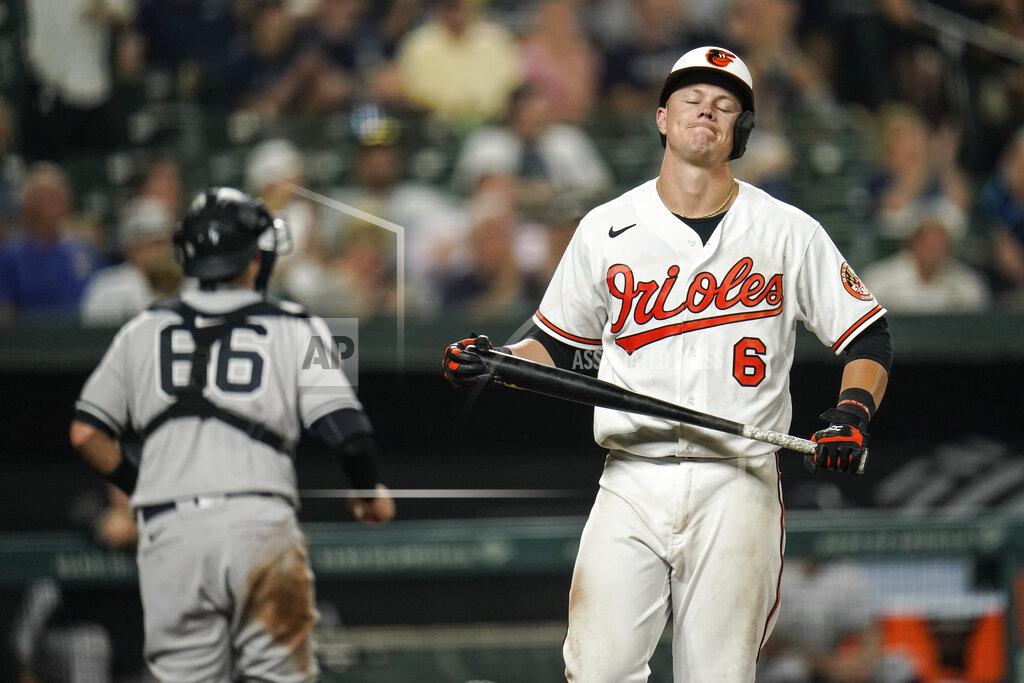 Julio Cortez Baltimore Orioles' Ryan Mountcastle (6) reacts after striking out to end the seventh inning as New York Yankees catcher Kyle Higashioka (66) runs to the dugout during a baseball game, Tuesday, Sept. 14, 2021, in Baltimore. (AP Photo/Julio Cortez)