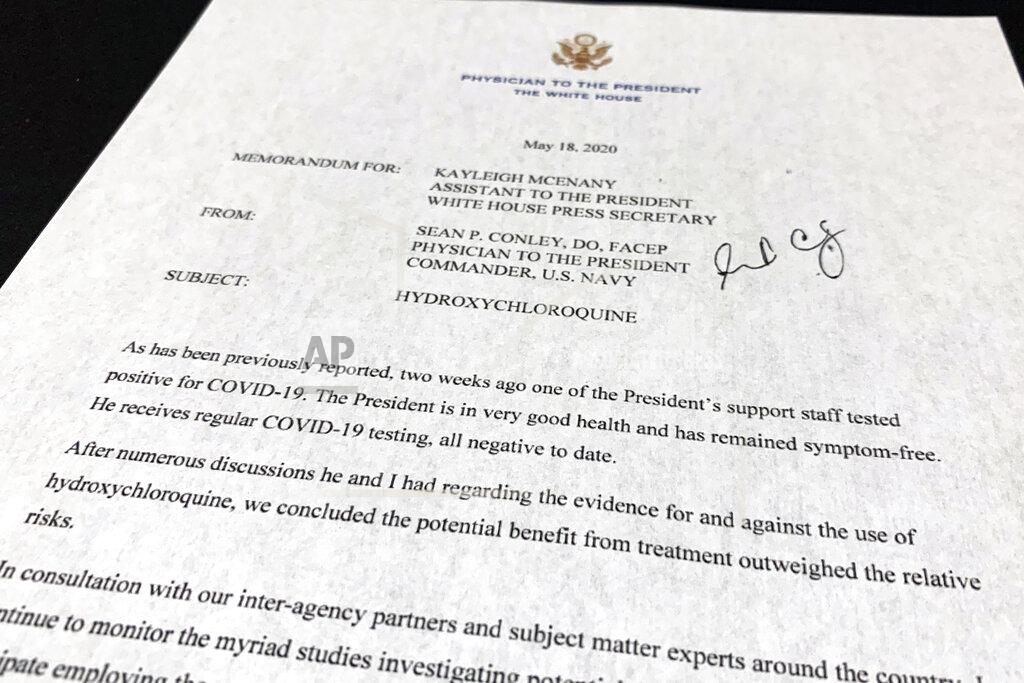 Jon Elswick The letter from White House physician Sean Conley to White House press secretary Kayleigh McEnany about President Donald Trump taking Hydroxychloroquine is photographed Monday, May 18, 2020. Trump says he has taken the unproven malaria drug to prevent symptoms should he get coronavirus. (AP Photo/Jon Elswick)