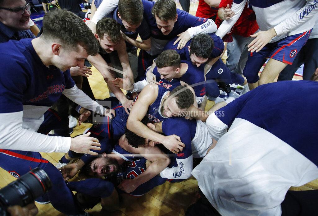 John Locher St. Mary's celebrates after defeating Gonzaga 60-47 in an NCAA college basketball game for the West Coast Conference men's tournament title, Tuesday, March 12, 2019, in Las Vegas. (AP Photo/John Locher)