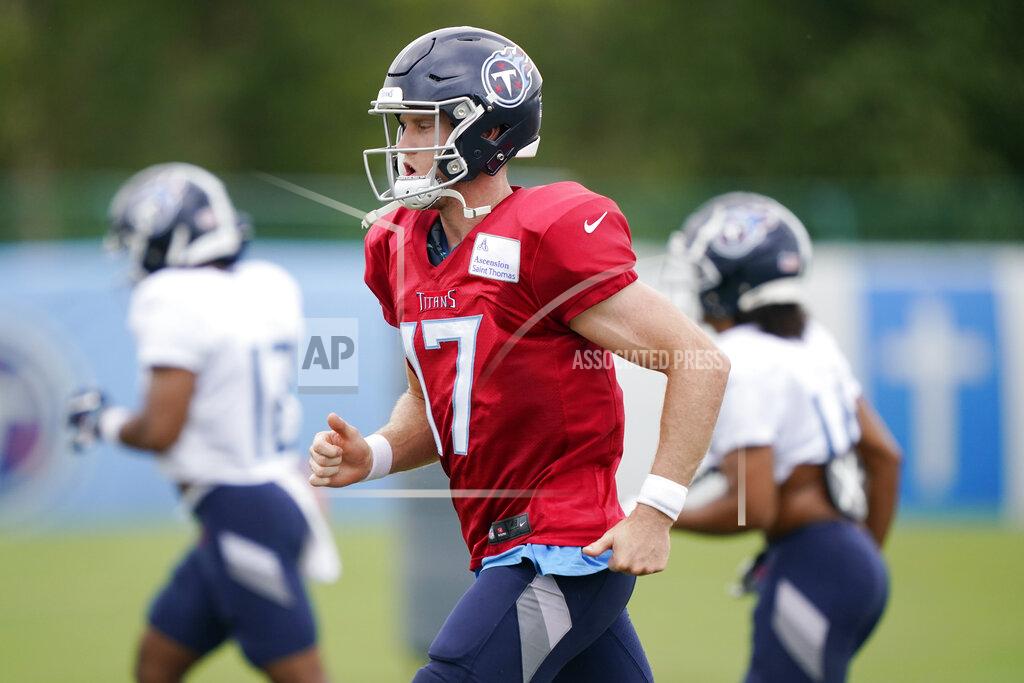 Mark Humphrey Tennessee Titans quarterback Ryan Tannehill (17) runs to a drill during NFL football training camp Friday, Aug. 28, 2020, in Nashville, Tenn. (AP Photo/Mark Humphrey, Pool)