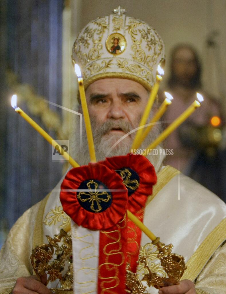 Darko Vojinovic FILE - In this Jan. 22, 2010 file photo, Bishop Amfilohije performs the liturgy in Belgrade's Congregational church, Serbia. Amfilohije, the head of the Serbian Orthodox Church in Montenegro, which led months of protests against the small Balkan state's pro-Western government, has died in hospital after contracting the coronavirus, the church said Friday, Oct. 30, 2020. (AP Photo/Darko Vojinovic, File)
