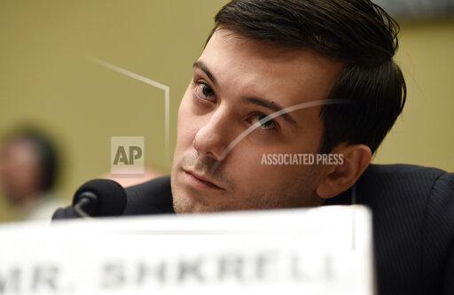 FILE - Former Turing Pharmaceuticals CEO Martin Shkreli attends the House Committee on Oversight and Reform Committee hearing on Capitol Hill in Washington, Feb. 4, 2016. A federal judge on Friday, Jan. 14, 2022 ordered Shkreli to return $64.6 million in profits he and his company reaped from inflating the price of the life-saving drug Daraprim and barred him from participating in the pharmaceutical industry for the rest of his life. (AP Photo/Susan Walsh, File)