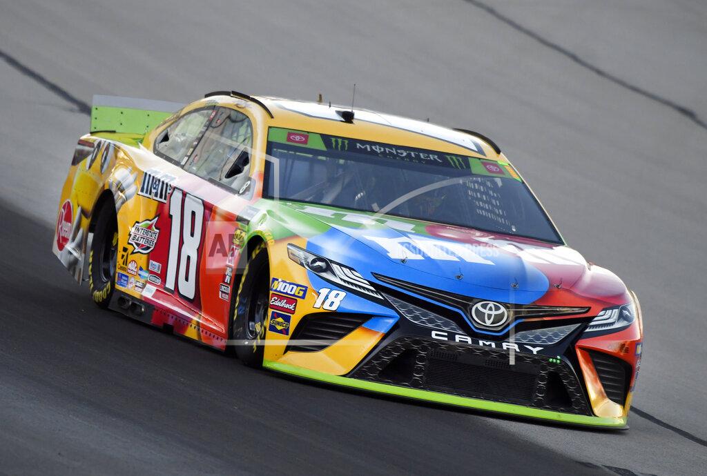 Larry Papke Kyle Busch heads into Turn 1 during practice for the NASCAR Cup Series auto race at Texas Motor Speedway in Forth Worth, Texas, Friday, Nov. 1, 2019. (AP Photo/Larry Papke)