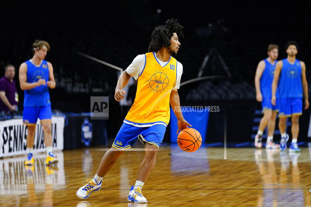 Matt Rourke UCLA's Tyger Campbell practices for the NCAA men's college basketball tournament, Thursday, March 24, 2022, in Philadelphia. (AP Photo/Matt Rourke)