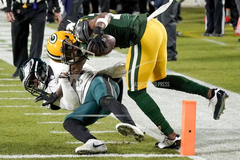 Morry Gash Green Bay Packers' Davante Adams catches a touchdown pass with Philadelphia Eagles' Darius Slay defending during the second half of an NFL football game Sunday, Dec. 6, 2020, in Green Bay, Wis. The pass was Aaron Rodgers' 400th career touchdown pass. (AP Photo/Morry Gash)